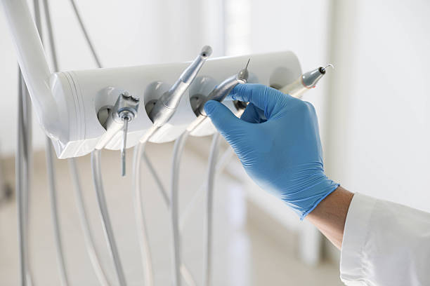 Professional Tooth Extraction technician working in Sheboygan Falls, WI